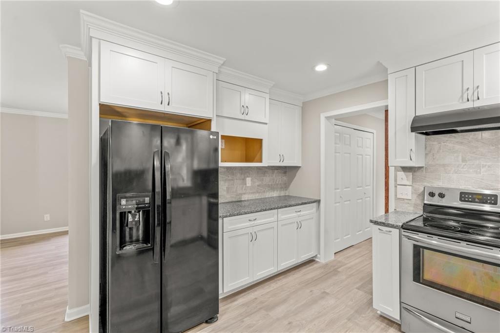5902 Siler Road Greensboro, NC 27406 - Photo 13 of 49 Refrigerator stays.