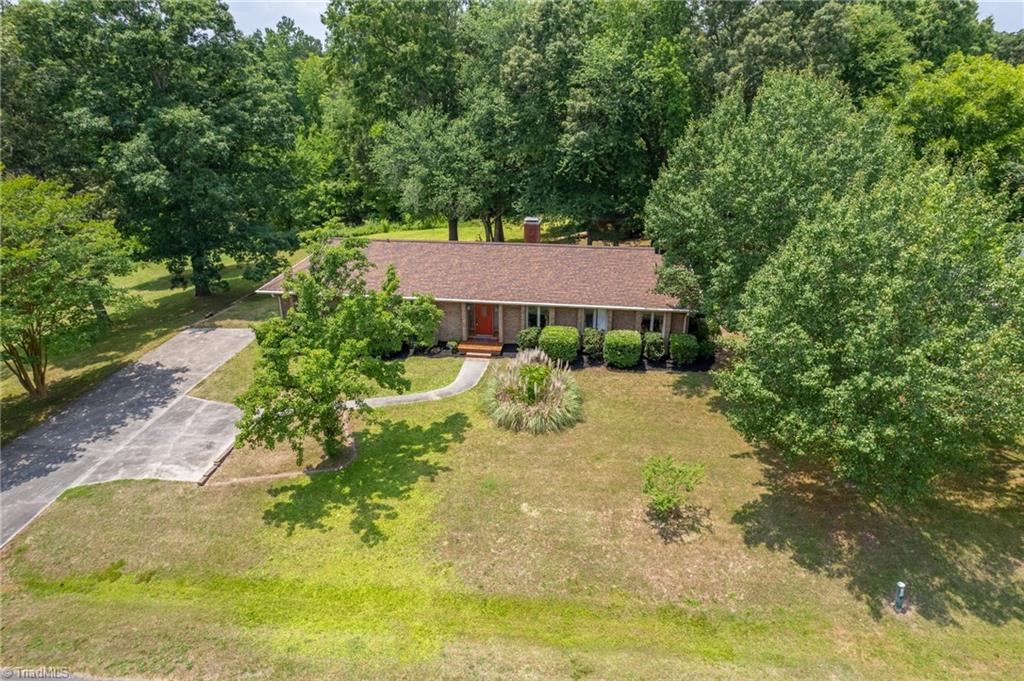 5902 Siler Road Greensboro, NC 27406 - Photo 44 of 49 2021 roof; 2018 Heat Pump/HVAC; Septic system pumped & inspected in 2021. 4 bedrooms, 3 full bathrooms on .72 ac lot. Guilford County taxes only.