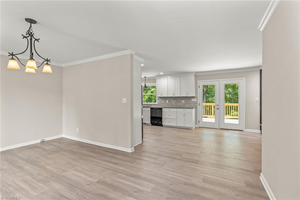 5902 Siler Road Greensboro, NC 27406 - Photo 6 of 49 with dining room & kitchen awaiting