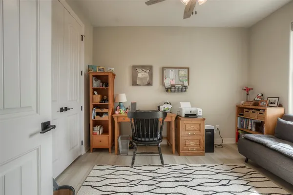 a living room with furniture and a window