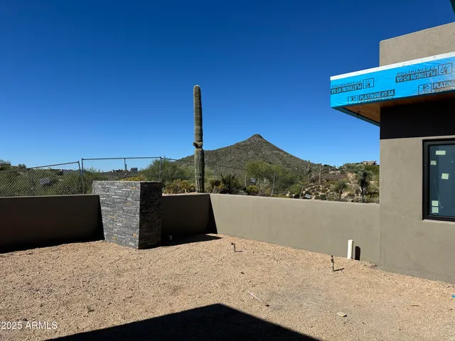 a view of a house with roof deck