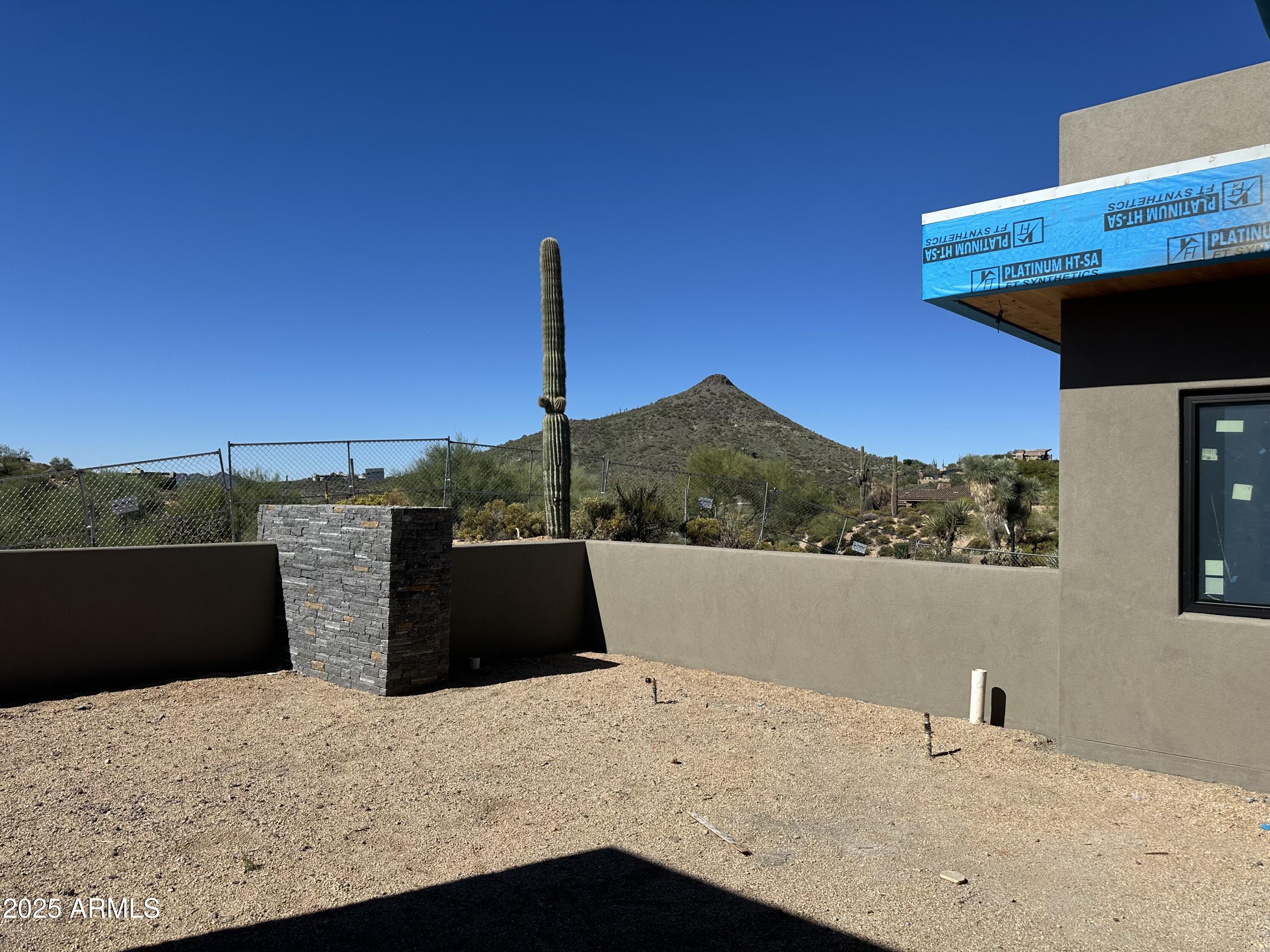 10023 East Filaree Lane Scottsdale, AZ 85262 - Photo 13 of 41 a terrace of a house with wooden floor