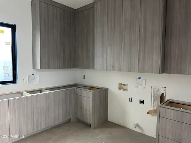 a view of a house with a snow in front of house