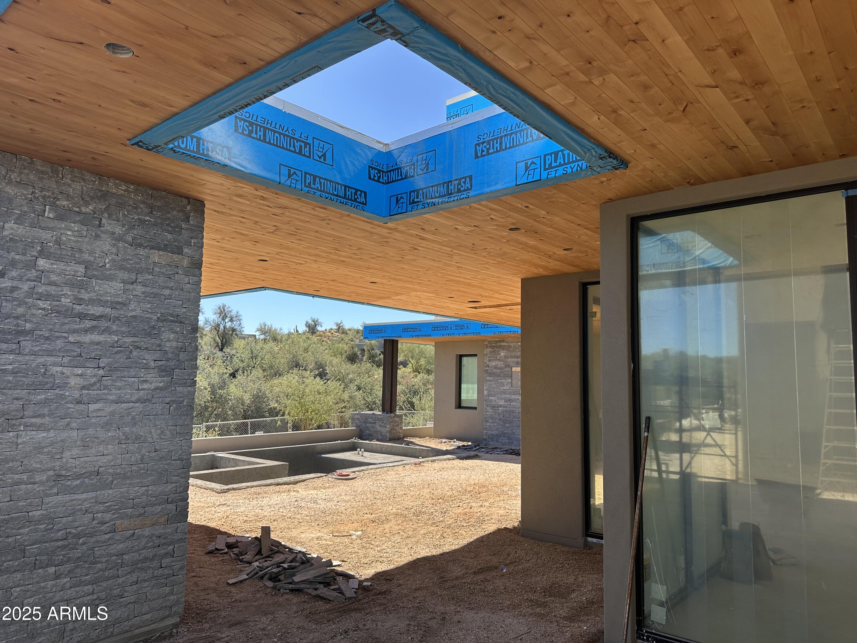 10023 East Filaree Lane Scottsdale, AZ 85262 - Photo 21 of 41 a view of a balcony with wooden floor