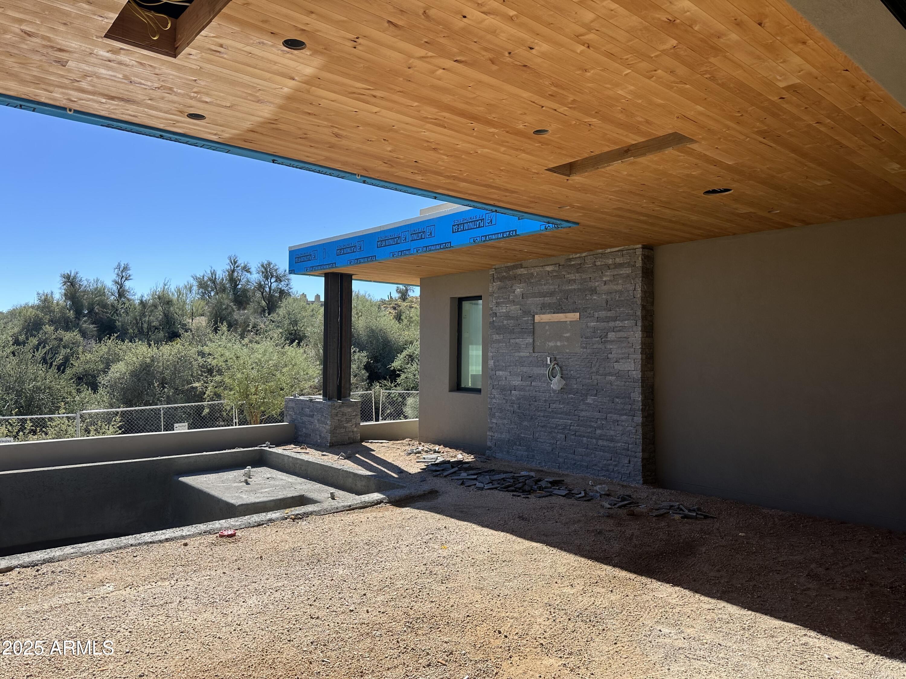 10023 East Filaree Lane Scottsdale, AZ 85262 - Photo 25 of 41 a view of a two chairs in the patio