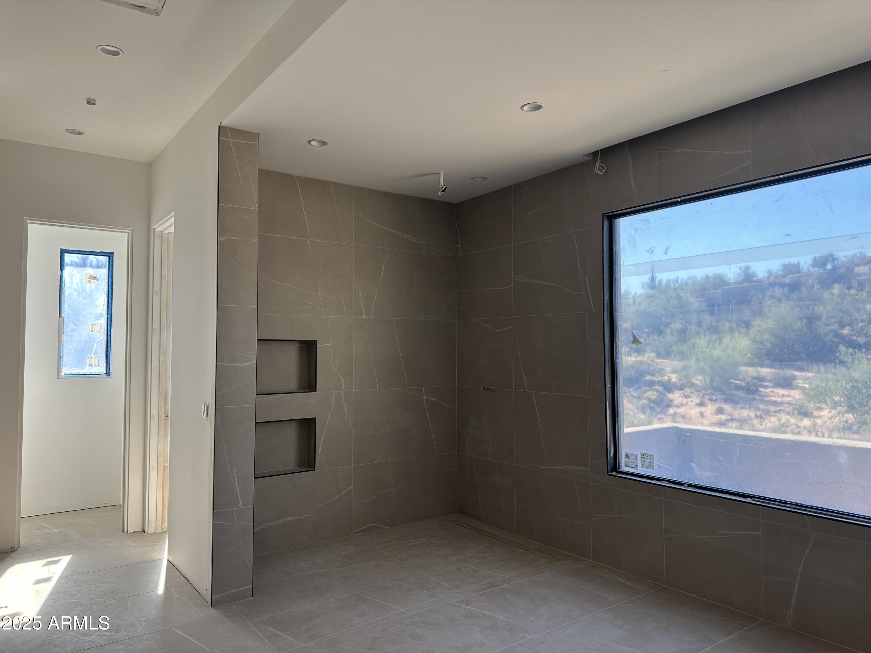 10023 East Filaree Lane Scottsdale, AZ 85262 - Photo 6 of 41 an empty room with windows