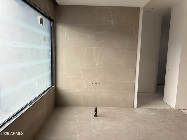 a view of a house with porch and furniture