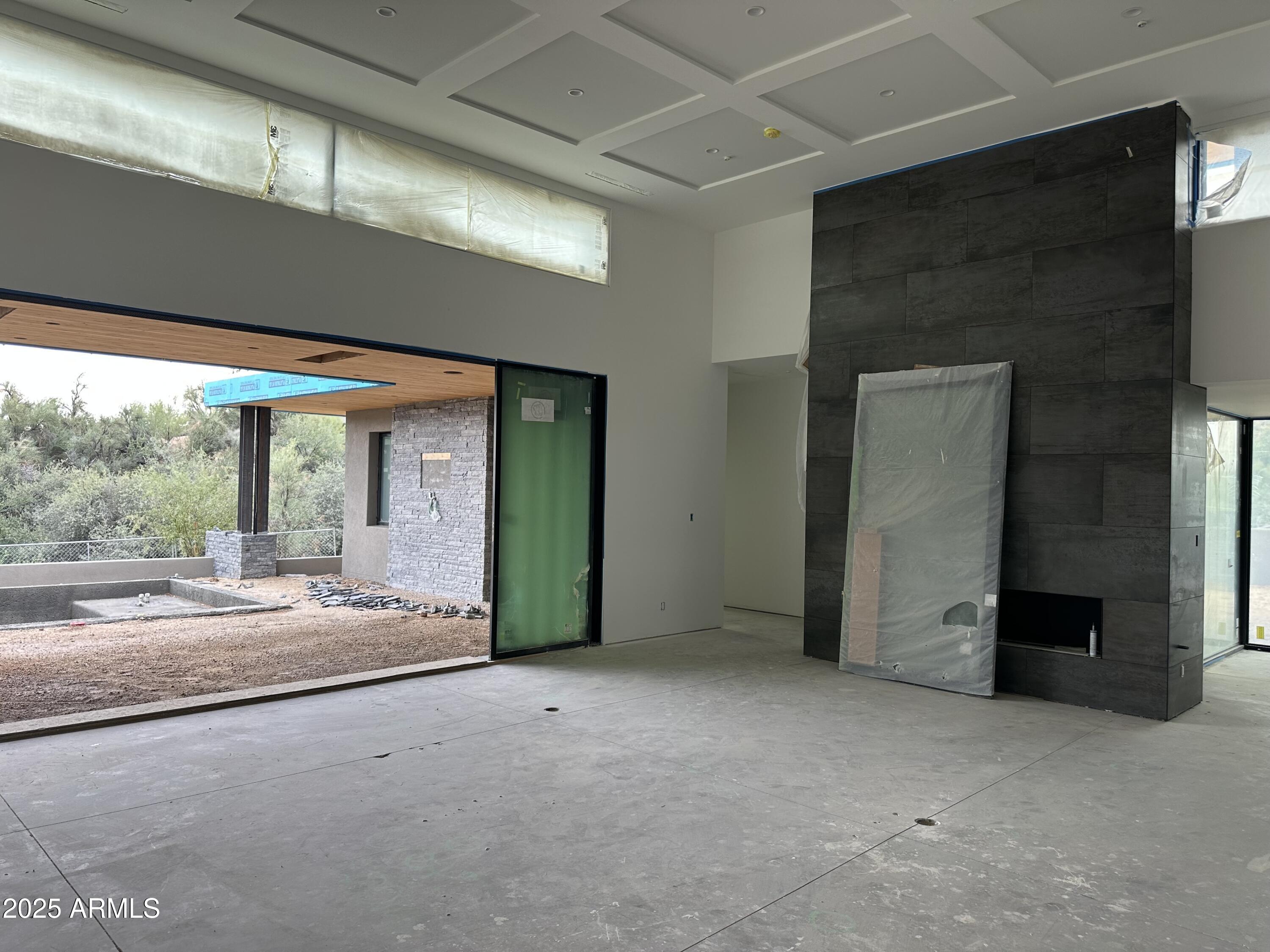 10023 East Filaree Lane Scottsdale, AZ 85262 - Photo 9 of 41 a view of a house with porch and furniture