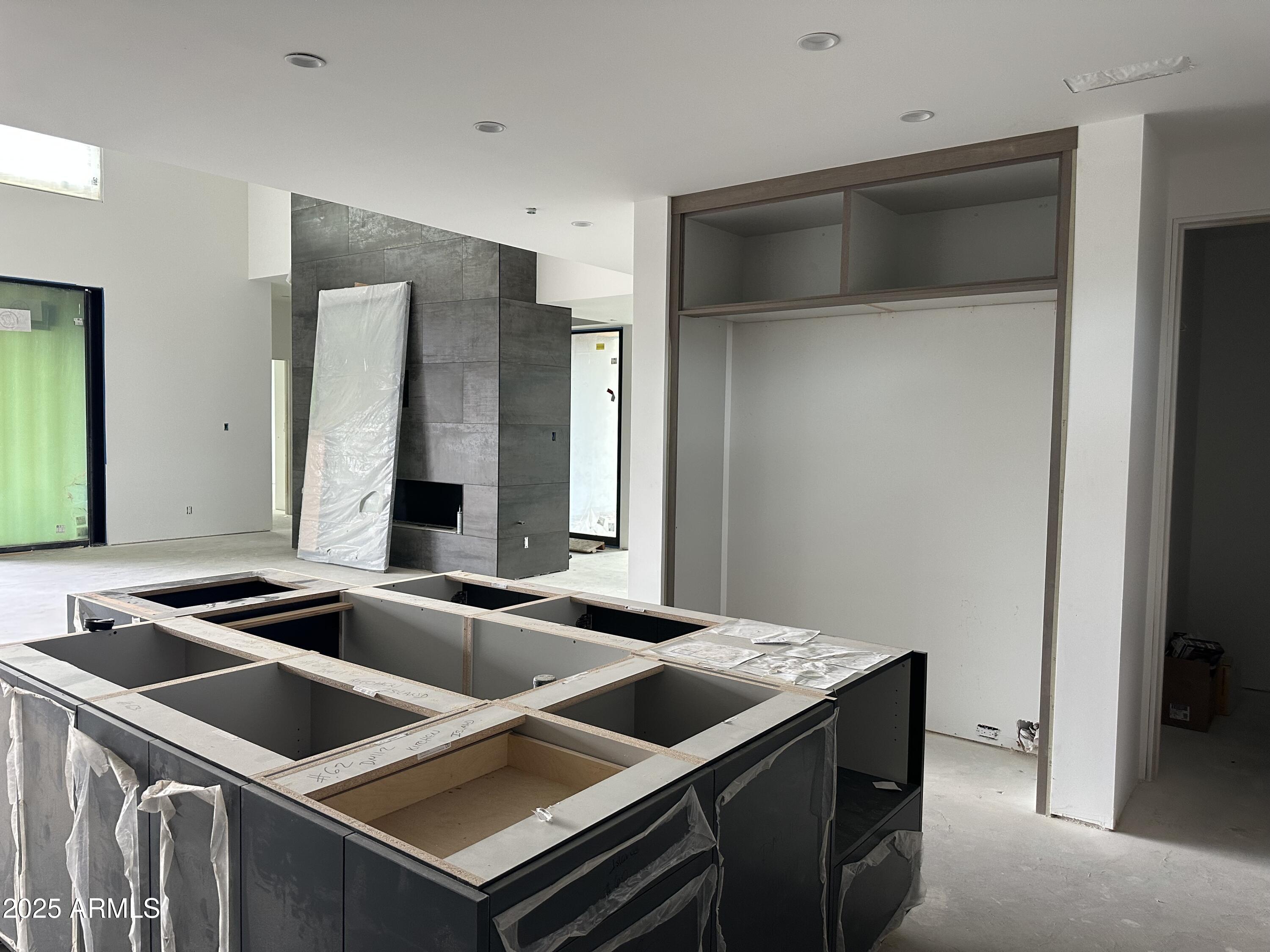 10023 East Filaree Lane Scottsdale, AZ 85262 - Photo 10 of 41 a kitchen that has a sink and a stove