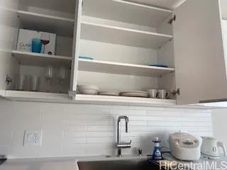 a bathroom with a toilet and a sink