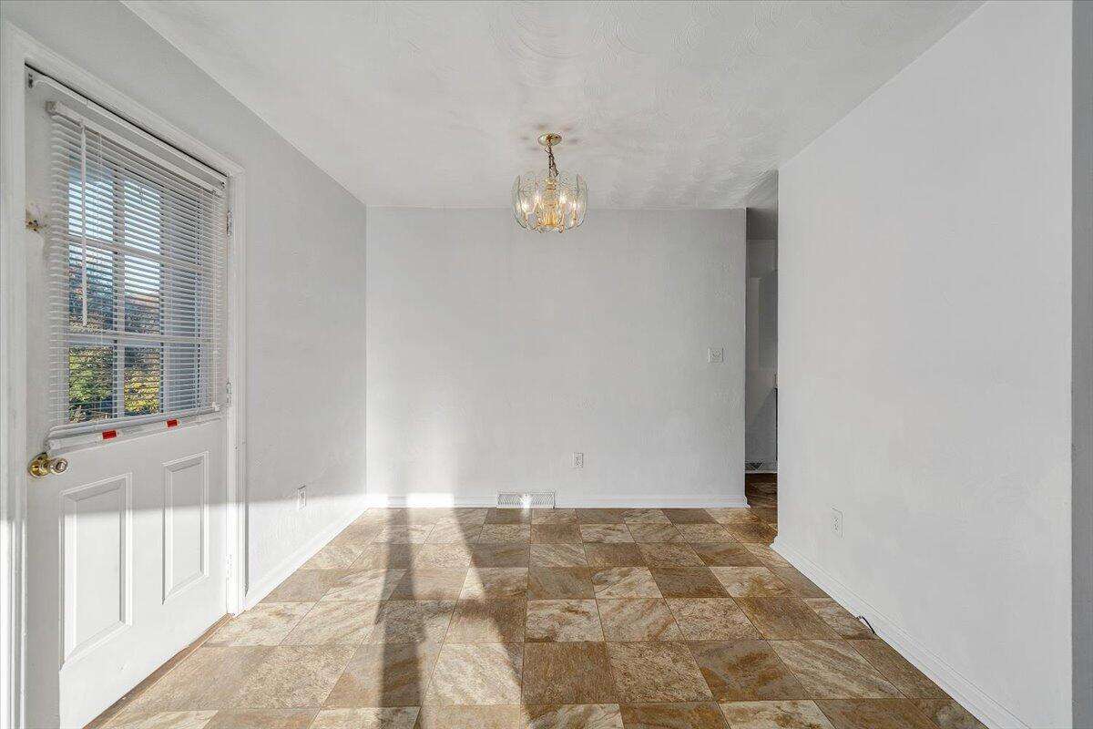 725 Ramada Road Vinton, VA 24179 - Photo 12 of 38 a view of an empty room and window