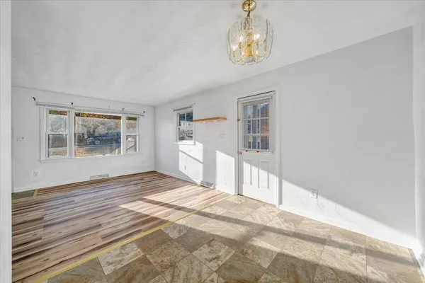 an empty room with windows