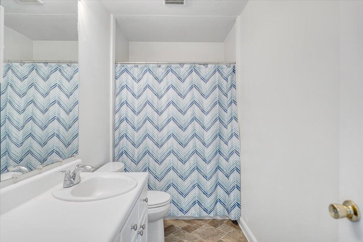 725 Ramada Road Vinton, VA 24179 - Photo 26 of 38 a bathroom with a sink and a mirror