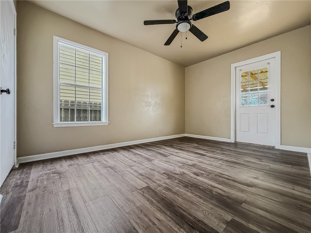 3437 Austin Street Corpus Christi, TX 78411 - Photo 19 of 35 a view of empty room with wooden floor and fan