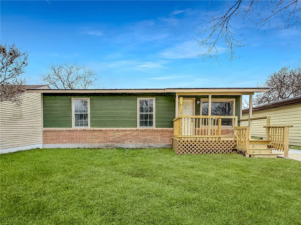 3437 Austin Street Corpus Christi, TX 78411 - Photo 2 of 35 front view of house with a yard