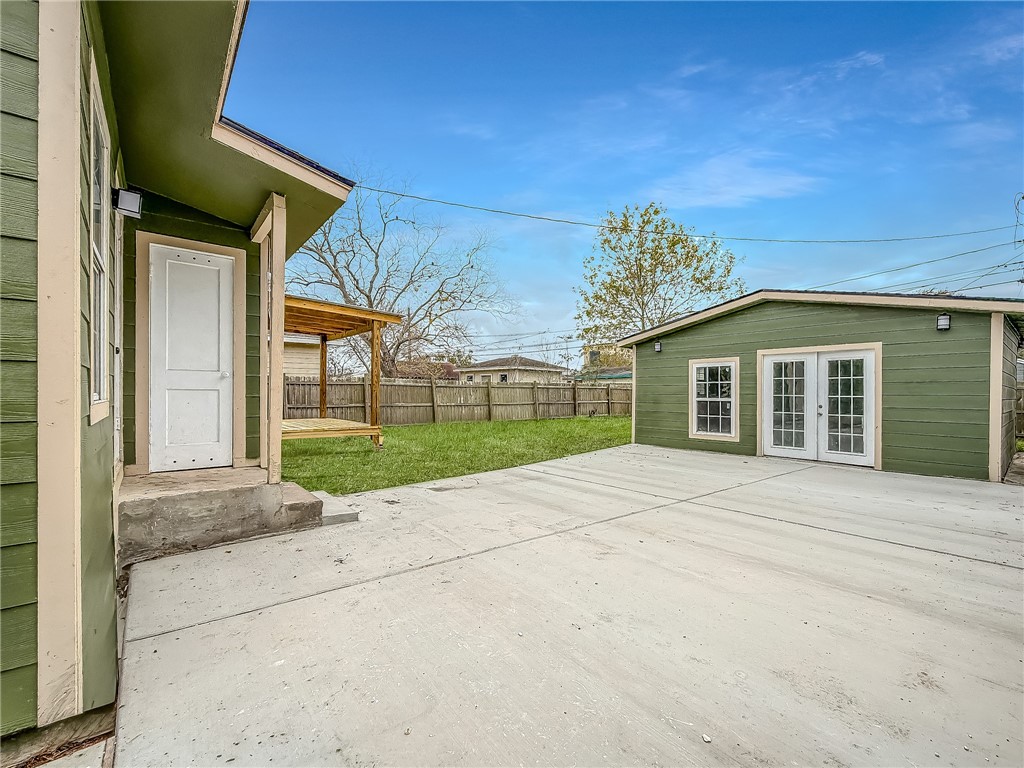3437 Austin Street Corpus Christi, TX 78411 - Photo 23 of 35 front view of a house with a street