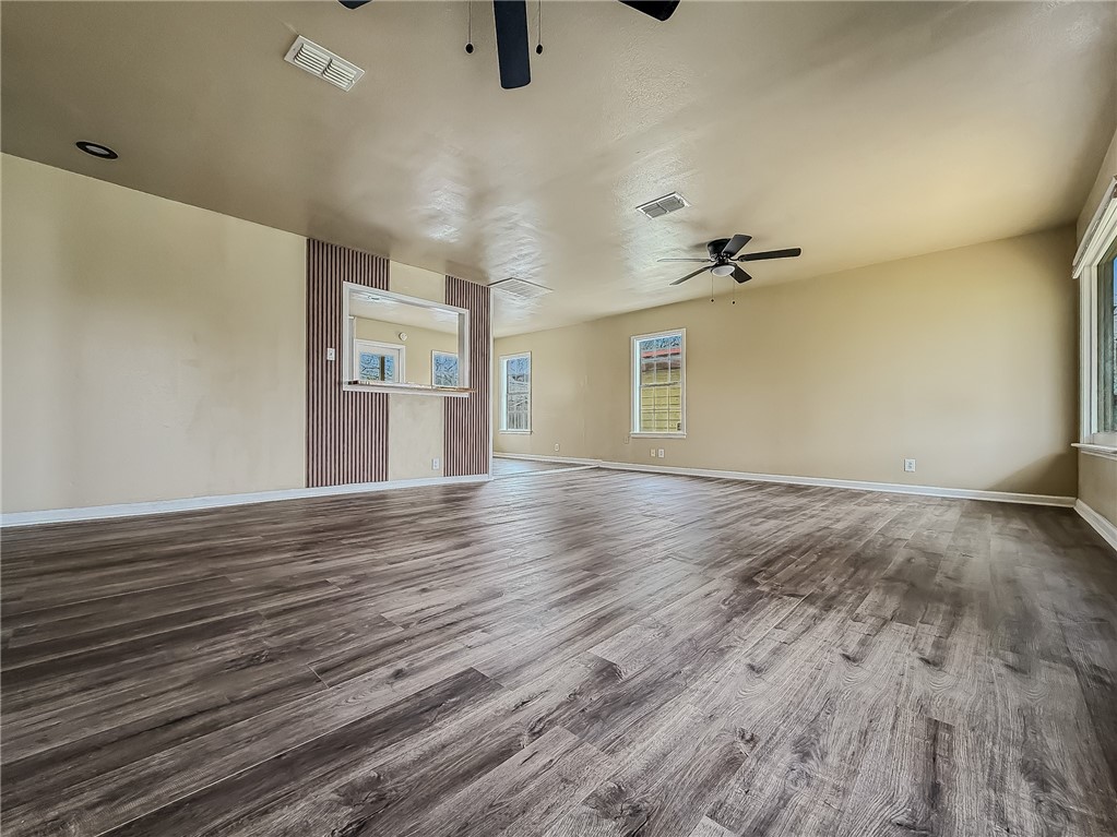 3437 Austin Street Corpus Christi, TX 78411 - Photo 6 of 35 wooden floor in an empty room