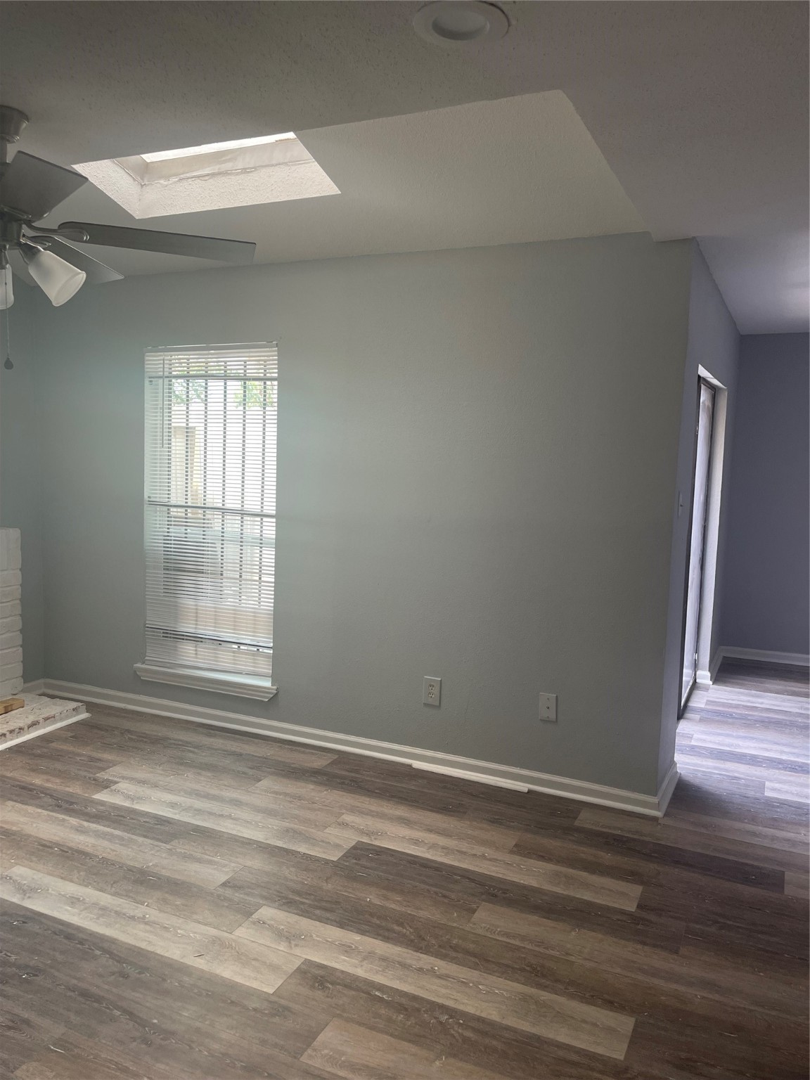 10912 Gulf Freeway, Unit 73 Houston, TX 77075 - Photo 16 of 27 a view of empty room with wooden floor and fan