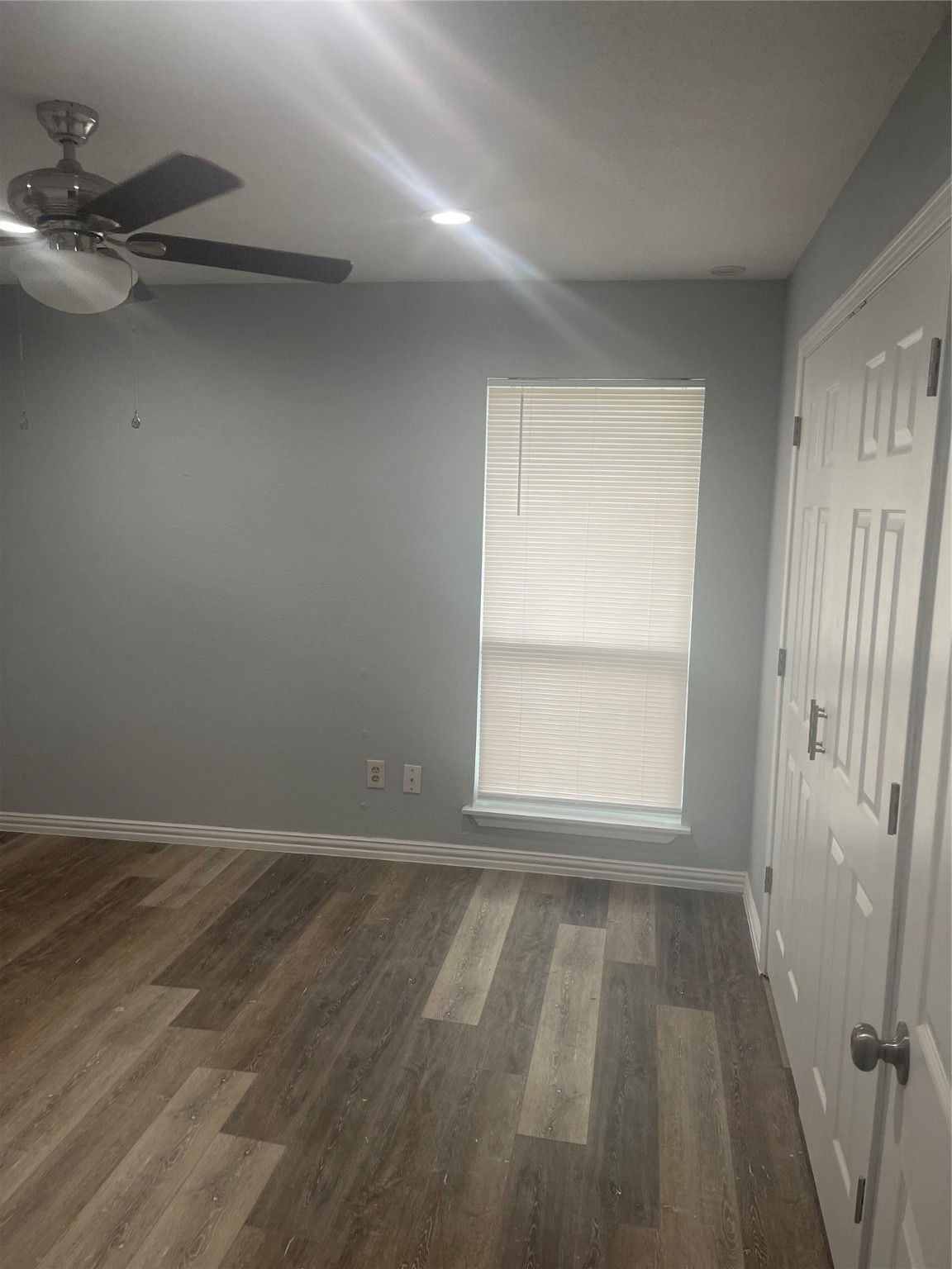 10912 Gulf Freeway, Unit 73 Houston, TX 77075 - Photo 27 of 27 wooden floor in an empty room with a window