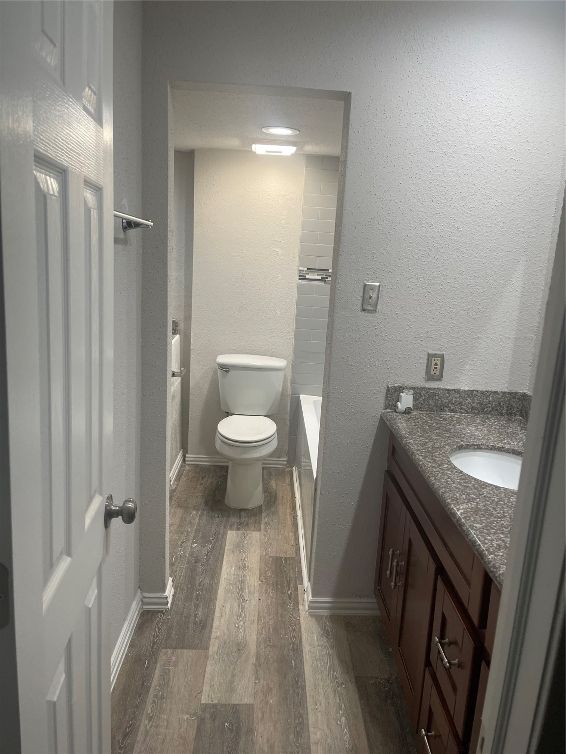 10912 Gulf Freeway, Unit 73 Houston, TX 77075 - Photo 4 of 27 a bathroom with a sink and a toilet