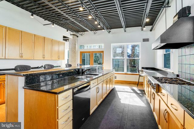 a view of a back yard of the house