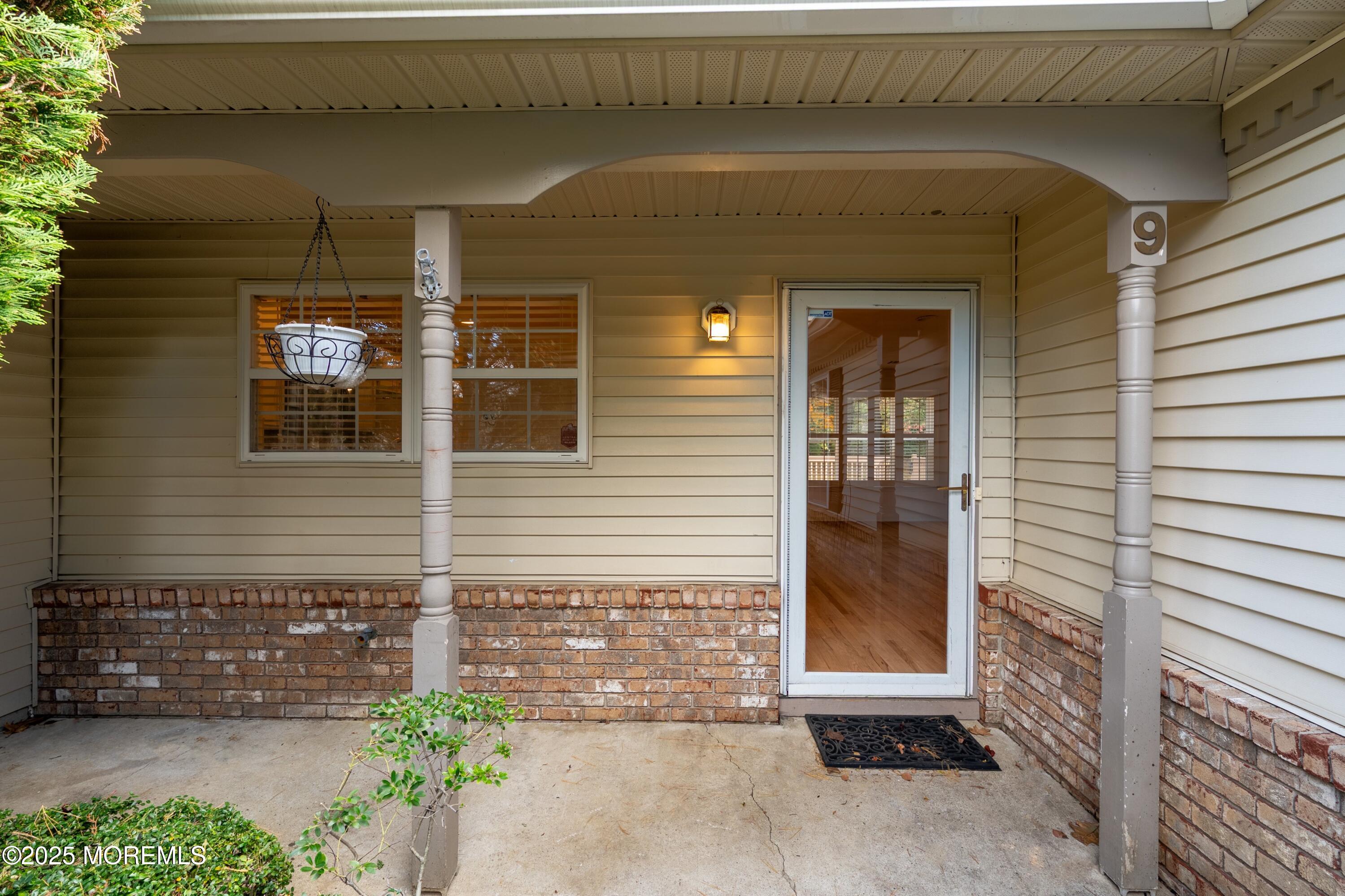 9 Ambrose Lane, Unit 141 Holmdel, NJ 07733 - Photo 11 of 50 a view of entrance door of the house