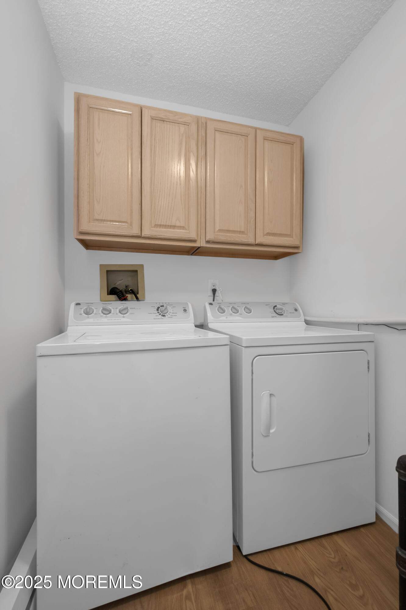 9 Ambrose Lane, Unit 141 Holmdel, NJ 07733 - Photo 27 of 50 a utility room with dryer and washer