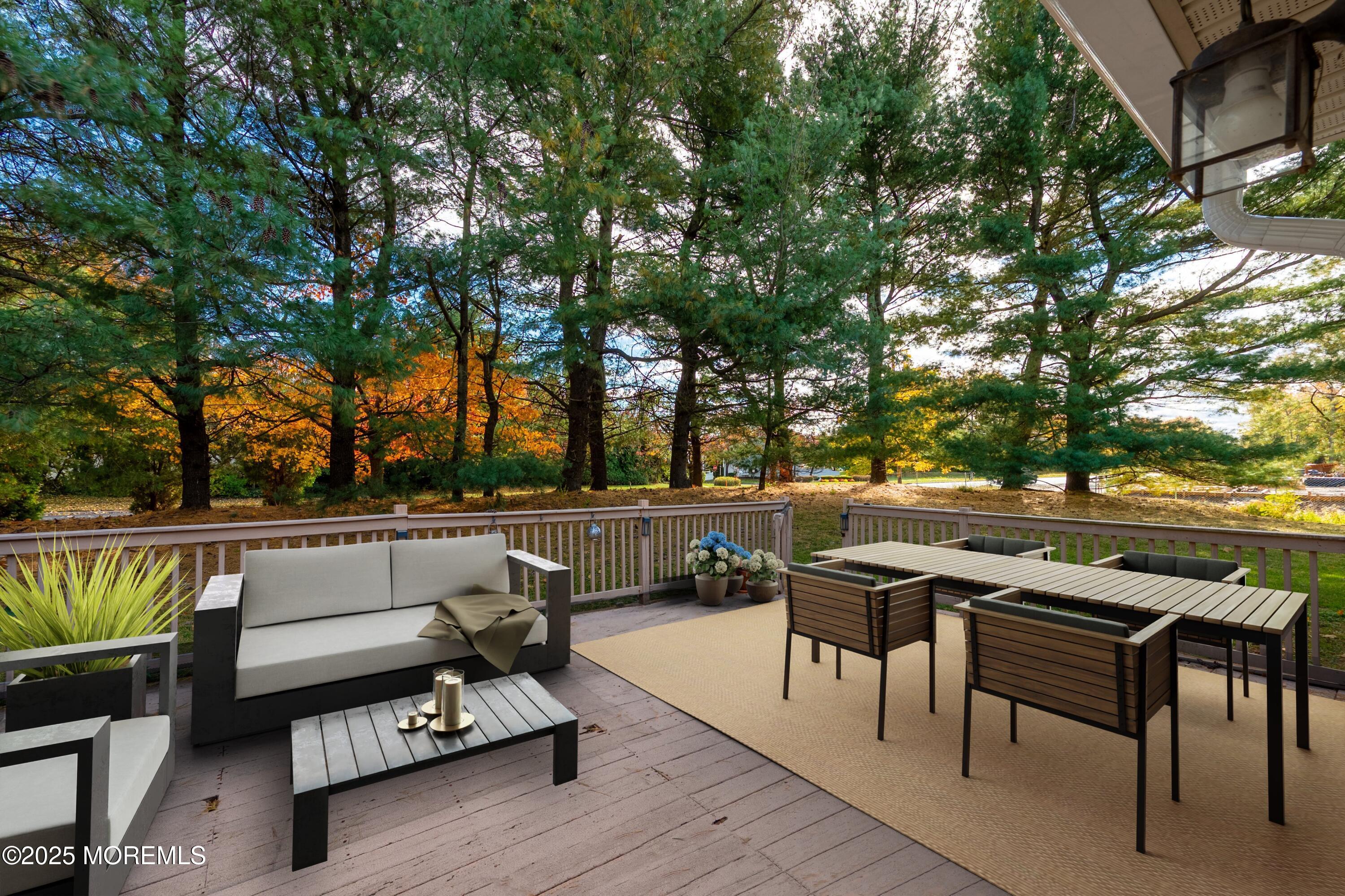 9 Ambrose Lane, Unit 141 Holmdel, NJ 07733 - Photo 3 of 50 a view of outdoor space with seating and trees