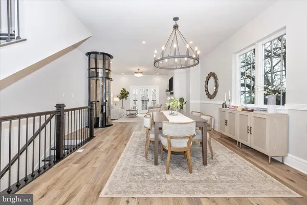 a stove top oven sitting inside of a kitchen