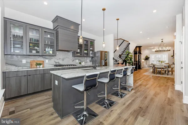 a bedroom with a large bed and a large window