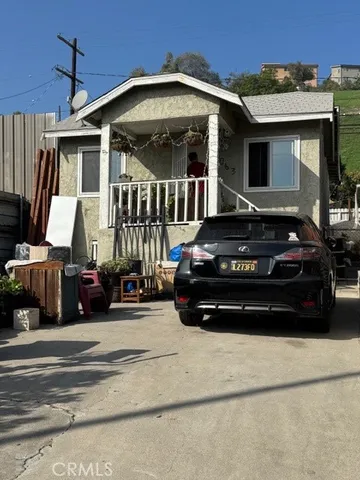 a car parked in front of a house