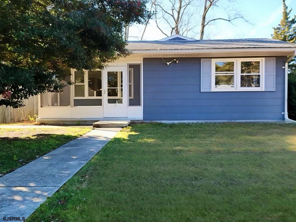 10 Point Pleasant Avenue Beesleys Point, NJ 08223 - Photo 1 of 16 a view of outdoor space yard and front view of a house