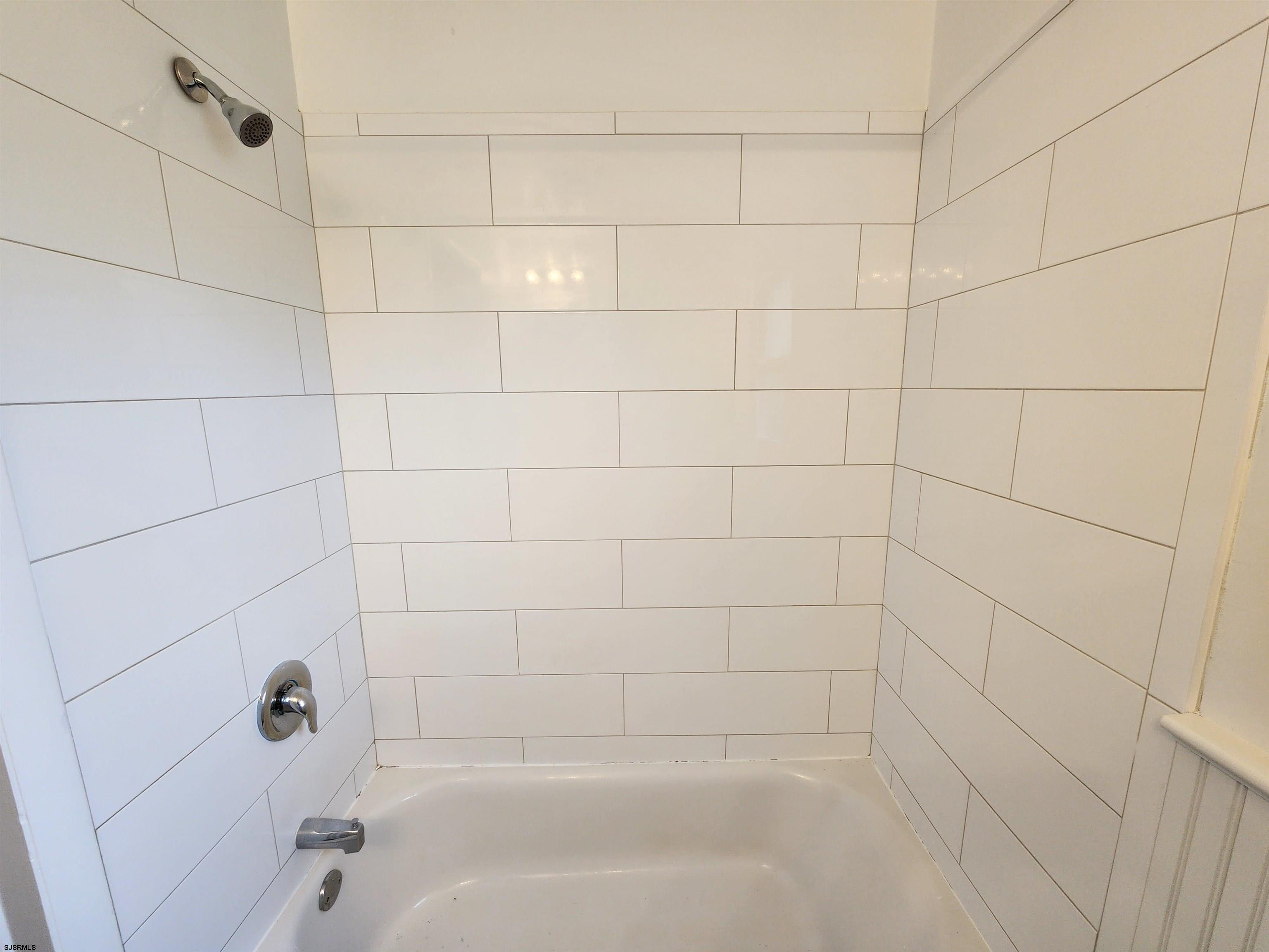 10 Point Pleasant Avenue Beesleys Point, NJ 08223 - Photo 13 of 16 a bathroom with a shower