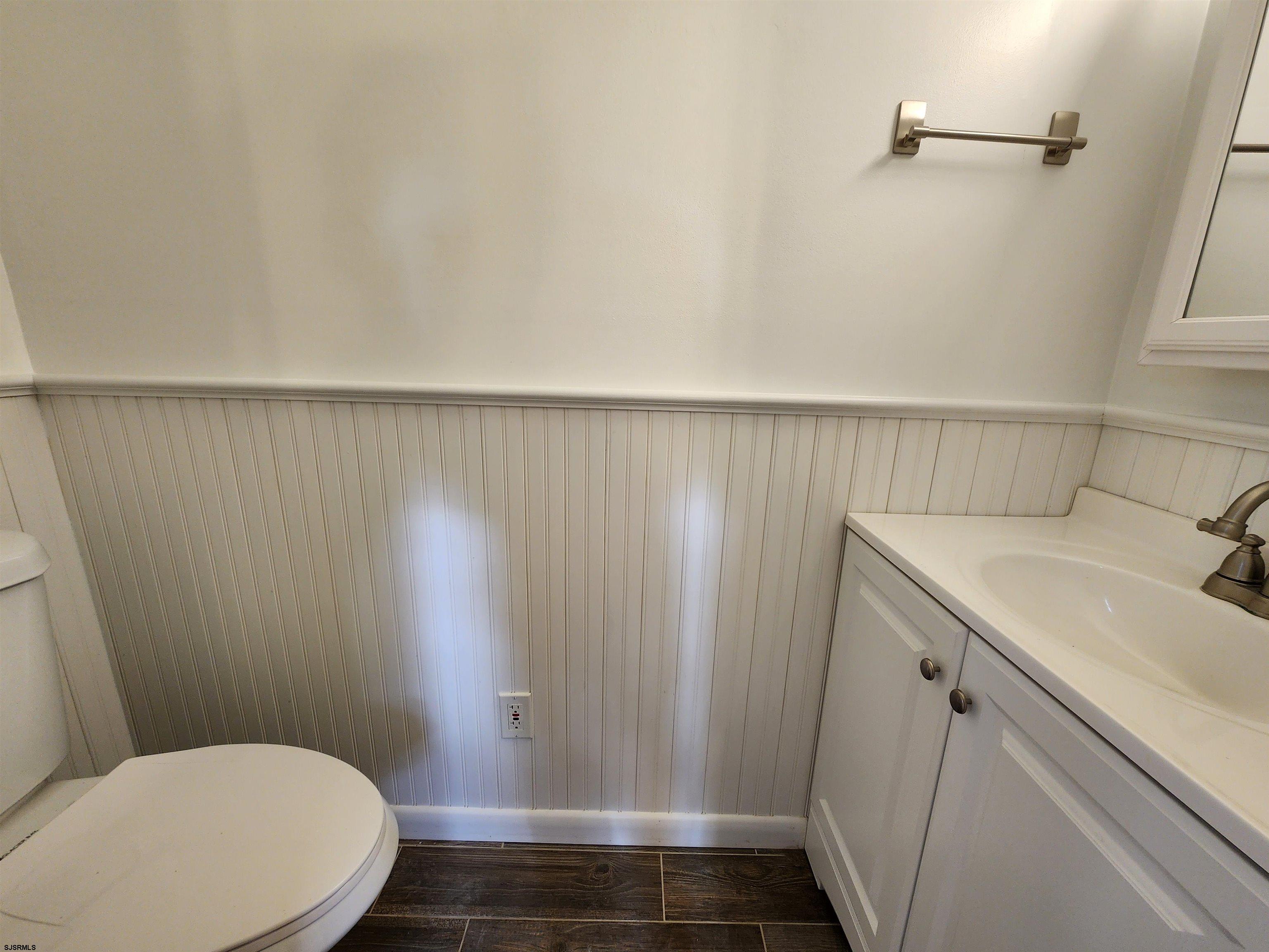 10 Point Pleasant Avenue Beesleys Point, NJ 08223 - Photo 9 of 16 a bathroom with a sink and toilet