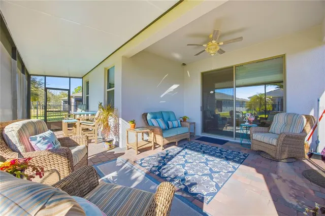 a view of an outdoor dining space with furniture