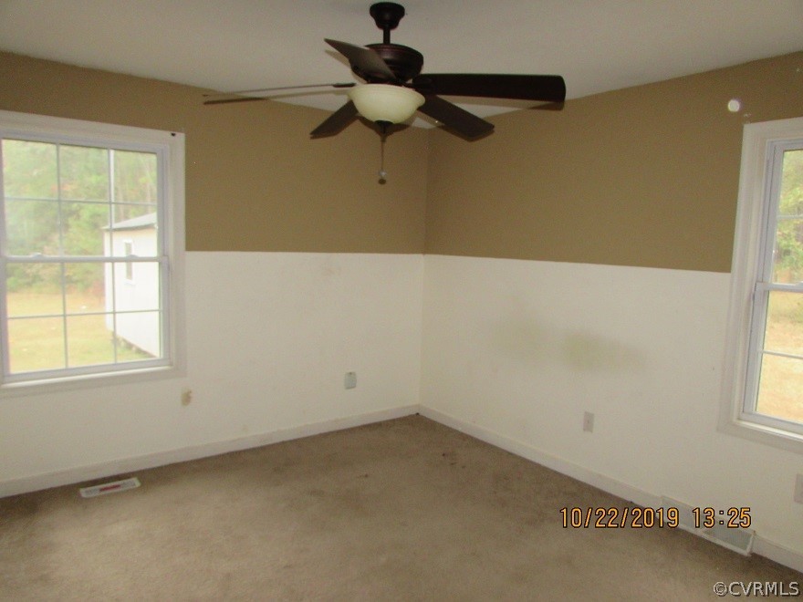 14704 Madison Road Dewitt, VA 23840 - Photo 17 of 20 a view of empty room with windows