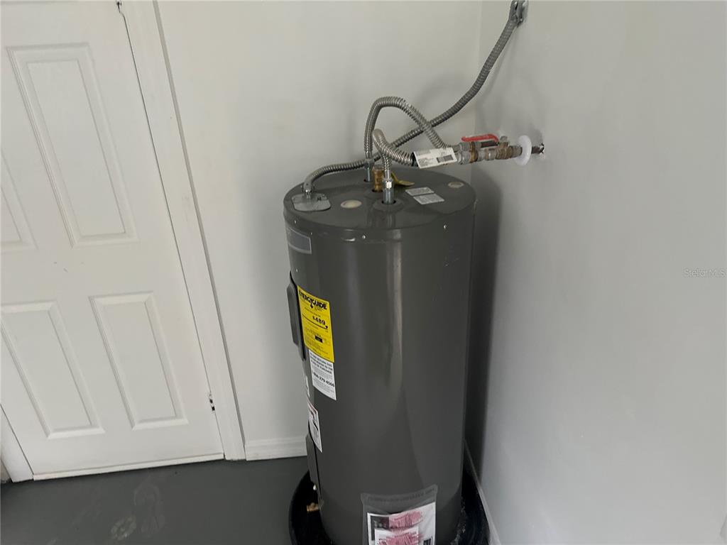 6179 West Star Court Homosassa, FL 34446 - Photo 19 of 21 a view of storage and utility room with a sink