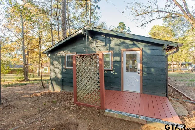 a view of a yard with an outdoor space