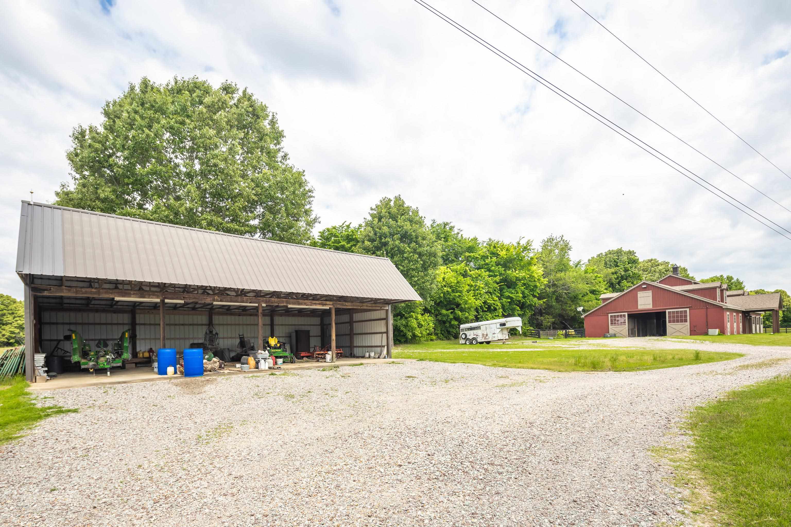 6085 Yum Yum Road Somerville, TN 38068 - Photo 40 of 40 a view of a house with swimming pool and sitting area
