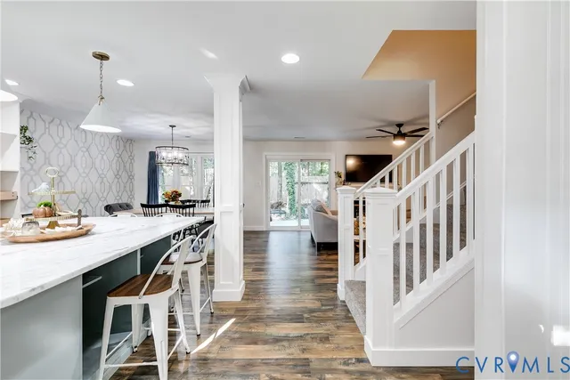 a open kitchen with sink and cabinets