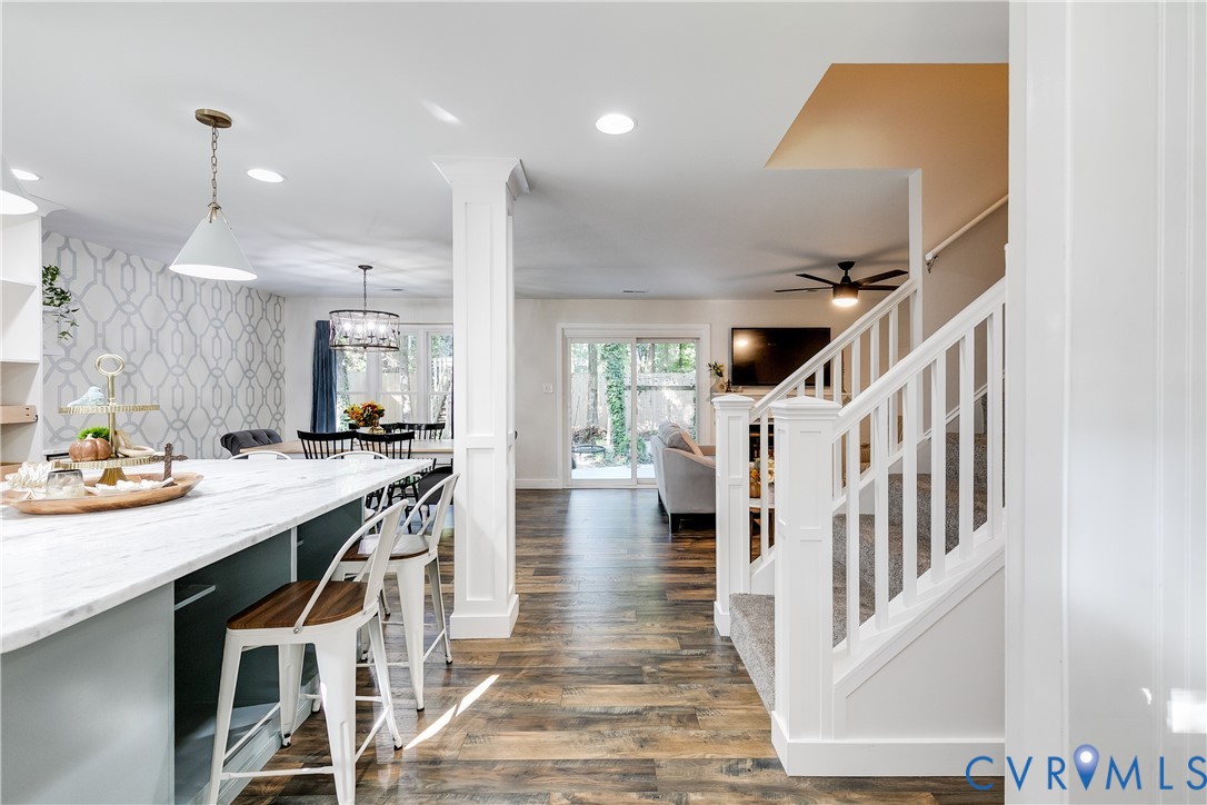 a open kitchen with sink and cabinets