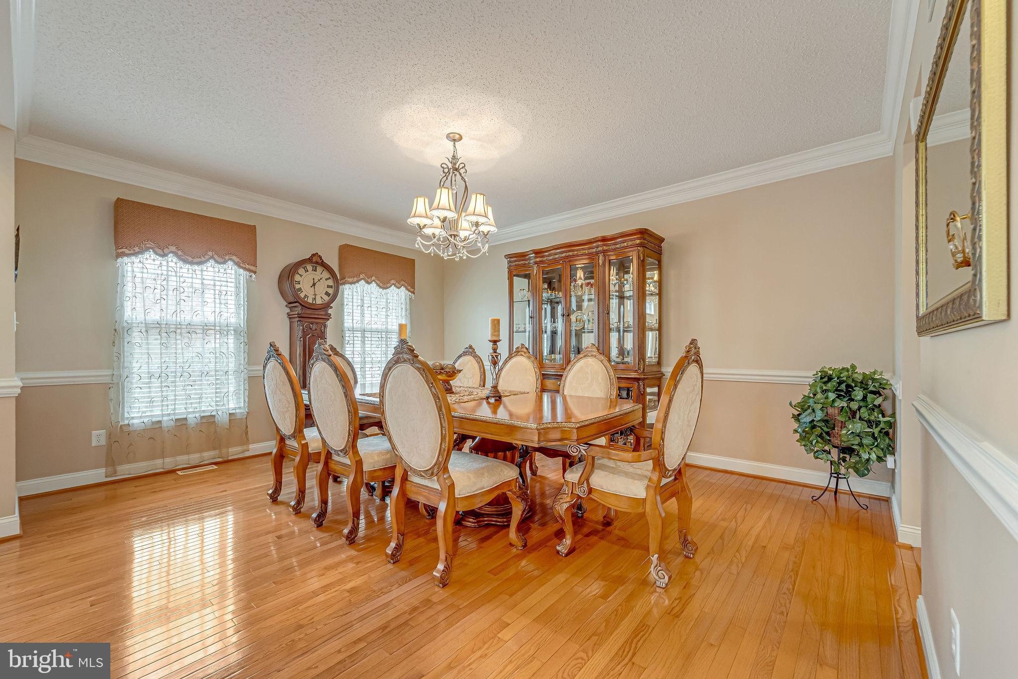2 Lansbrook Court Sewell, NJ 08080 - Photo 14 of 44 a view of a dining room with furniture window and wooden floor