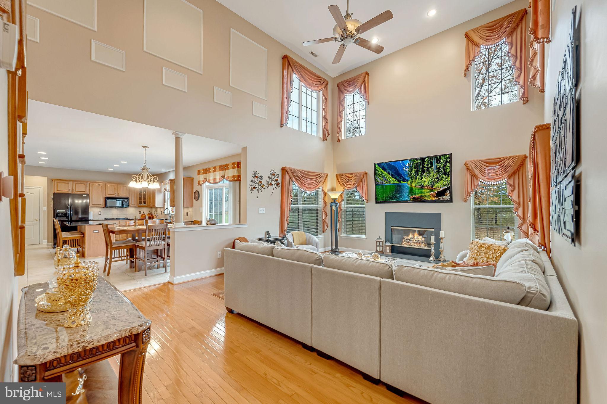 2 Lansbrook Court Sewell, NJ 08080 - Photo 18 of 44 a living room with furniture and a fireplace