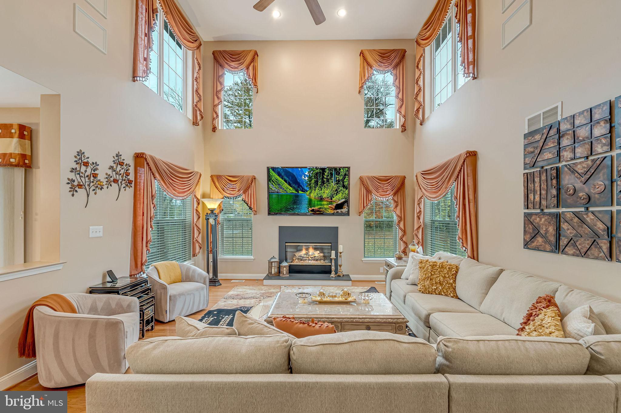 2 Lansbrook Court Sewell, NJ 08080 - Photo 19 of 44 a living room with furniture and a fireplace