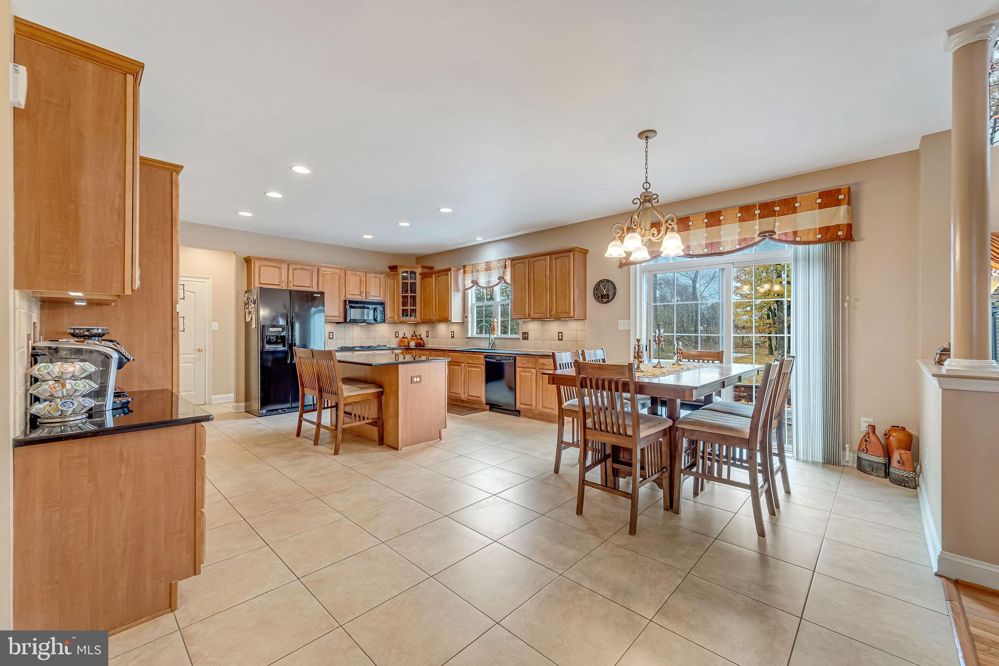 2 Lansbrook Court Sewell, NJ 08080 - Photo 22 of 44 a view of a dining room with furniture window and outside view