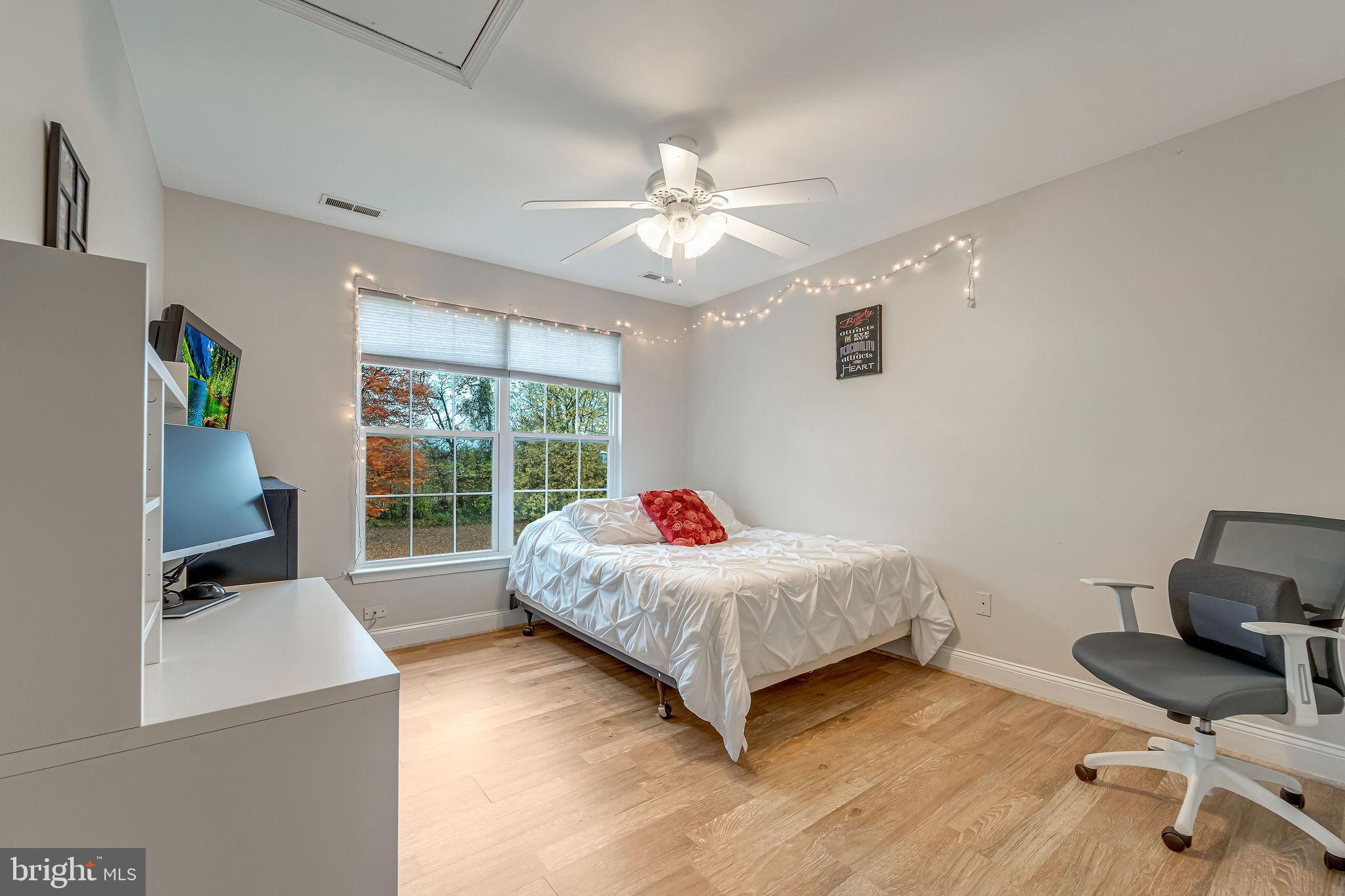 2 Lansbrook Court Sewell, NJ 08080 - Photo 28 of 44 a living room with a bed furniture and a window
