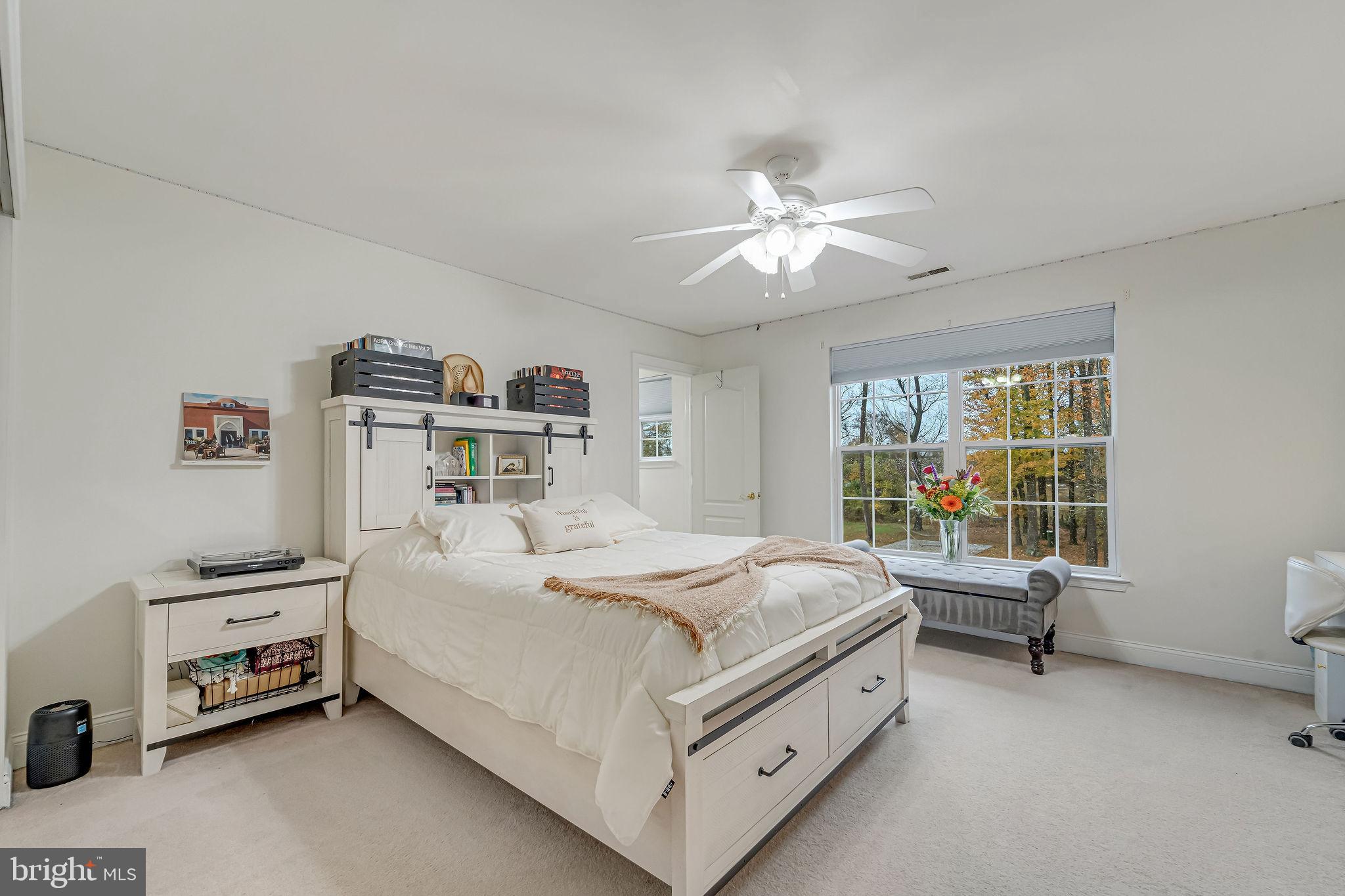 2 Lansbrook Court Sewell, NJ 08080 - Photo 31 of 44 a bed room with a bed and a chair