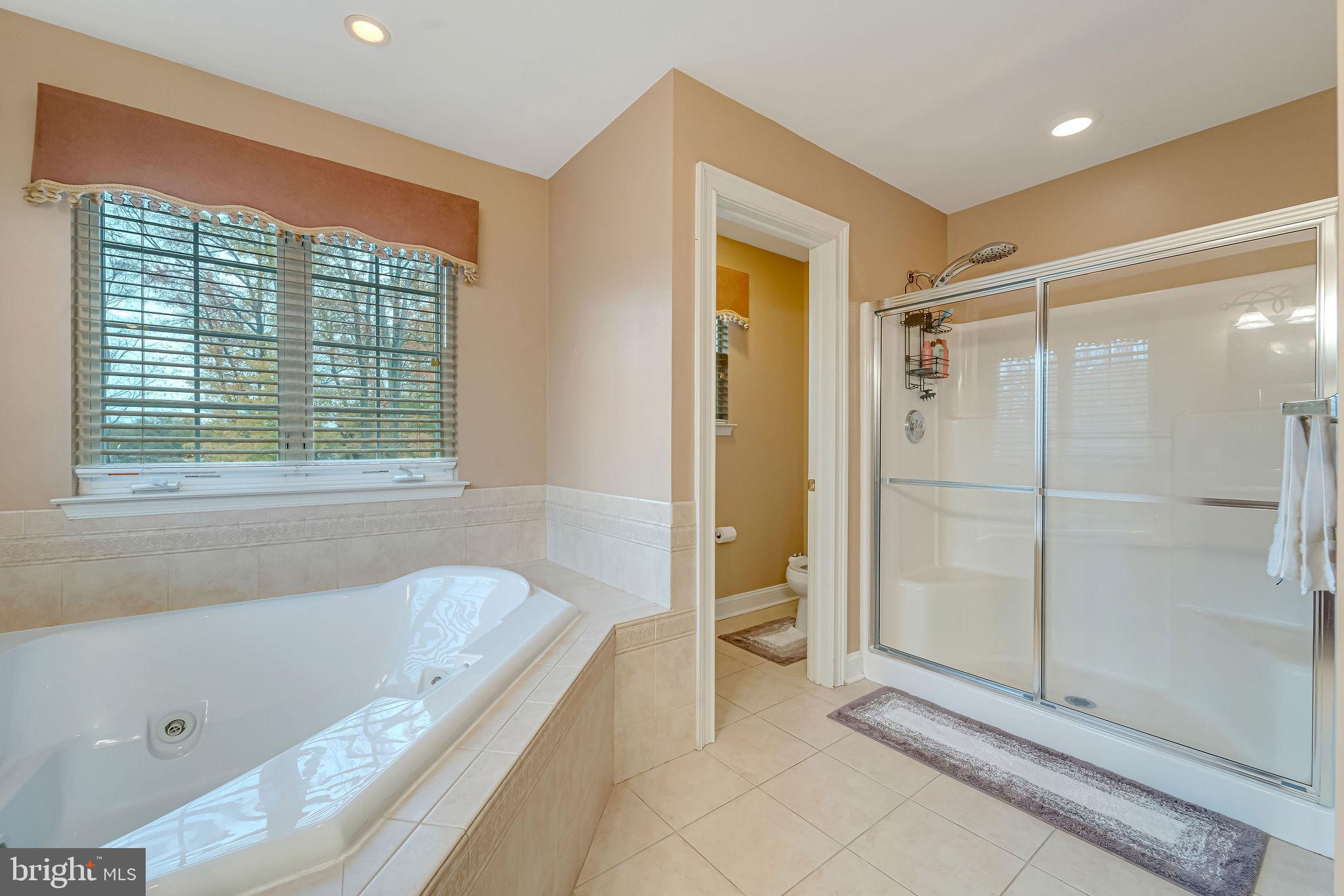 2 Lansbrook Court Sewell, NJ 08080 - Photo 37 of 44 a bathroom with a tub shower and sink