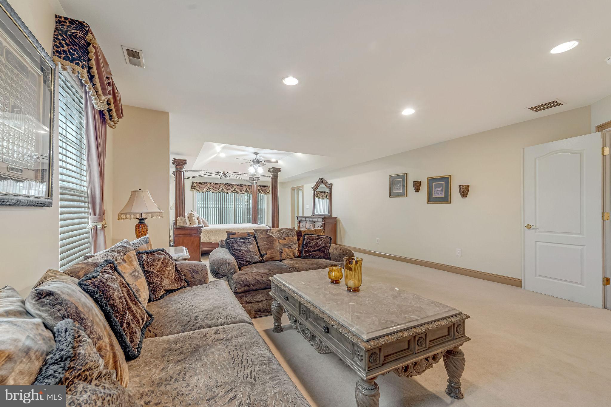 2 Lansbrook Court Sewell, NJ 08080 - Photo 38 of 44 a living room with furniture and a large window