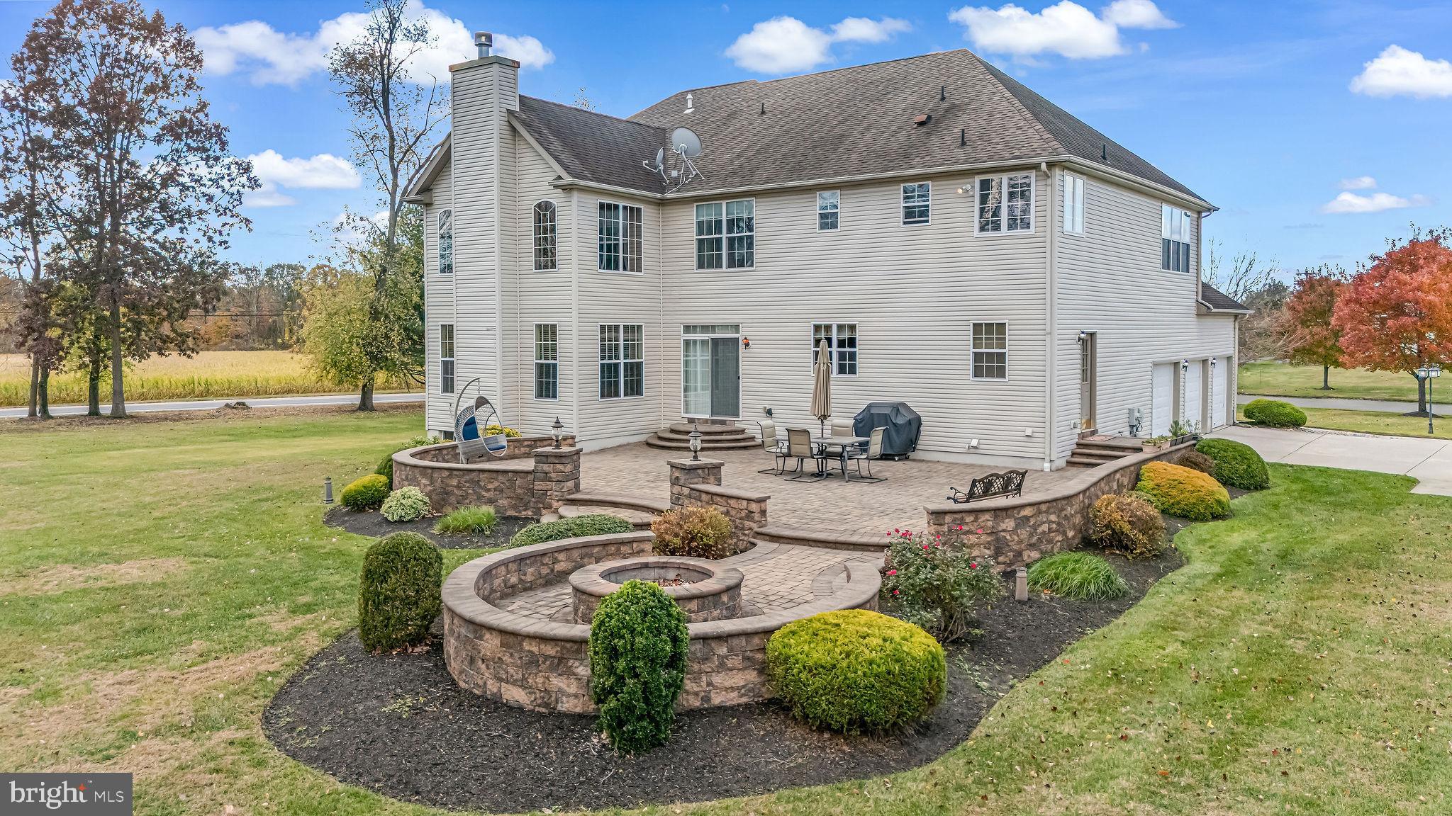 2 Lansbrook Court Sewell, NJ 08080 - Photo 5 of 44 a view of a house with backyard and sitting area